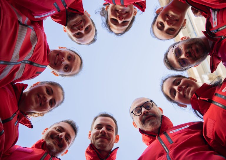 Cara dos voluntarios em circulo